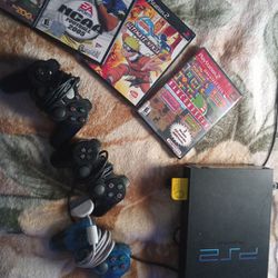 PlayStation 2 With Games And Controllers