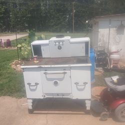 a vintage 1920s to 1930s "Home Comfort" wood/coal-burning kitchen cook stove