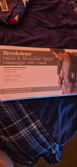 Massager/neck and shoulder three different settings with heat 10 different levels of rhythmic percussion