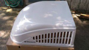 RV roof air conditioner working or four parts