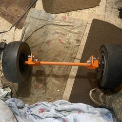 Axle With Sprocket New Tires $30.00