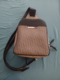Grey Calvin klein shoulder bag & brown dooney & bourke wallet