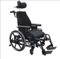 TILT IN SPACE MANUAL WHEELCHAIR- PAID $3,000