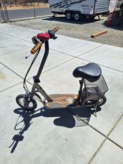 Mangoo's electric scooter