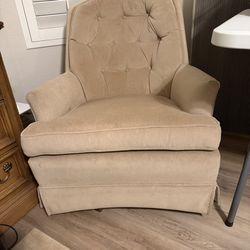 Rocking and swivel chair. New upholstery. Like brand new. No rips, no tears, no stains. Neutral color. Very comfortable. $75.00
