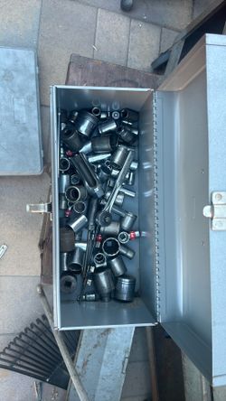 Assorted sockets adapters and wrench