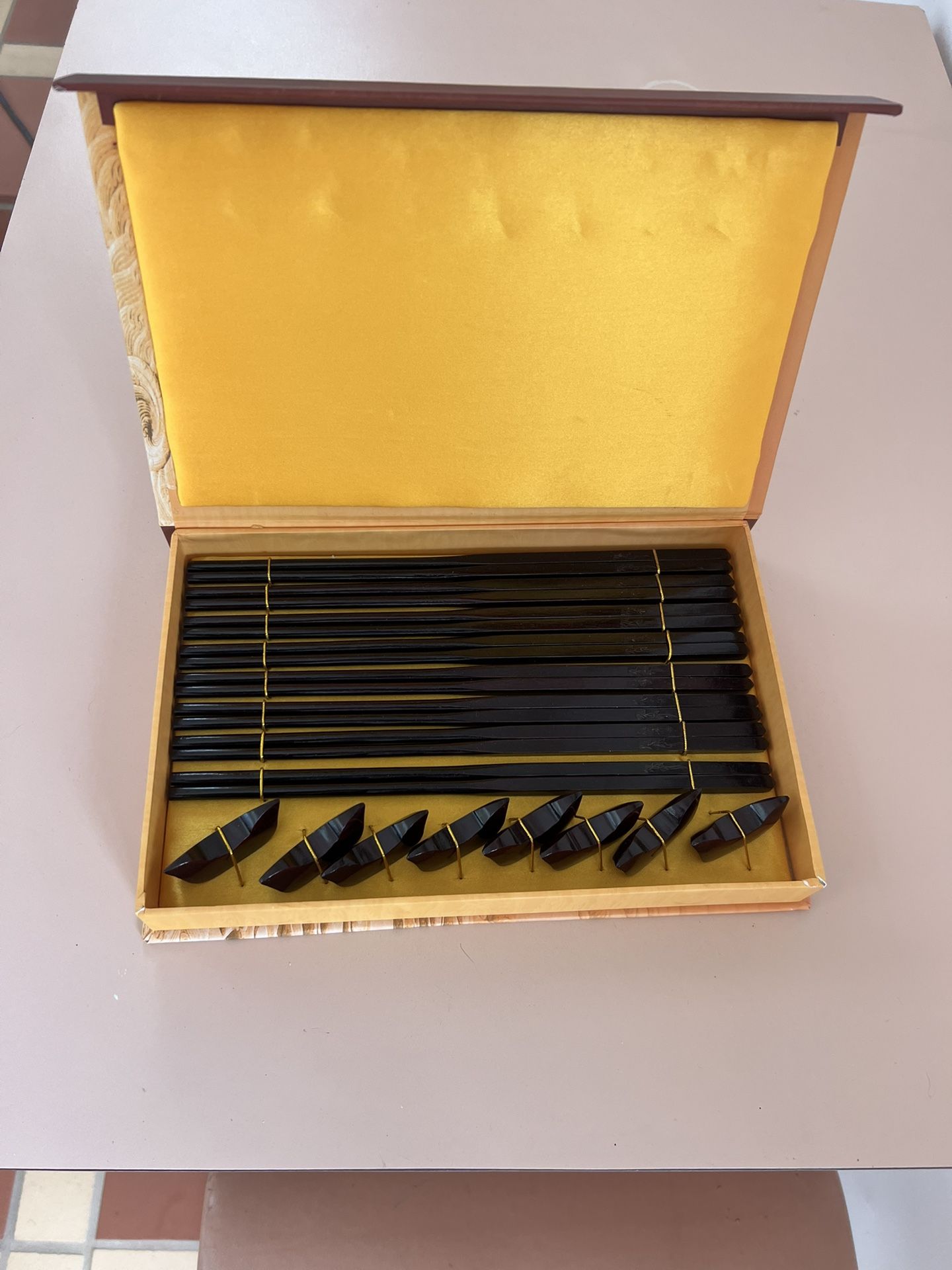 EIGHT CHINESE LACQUERED CHOPSTICKS AND RESTS