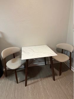 Two chairs and table