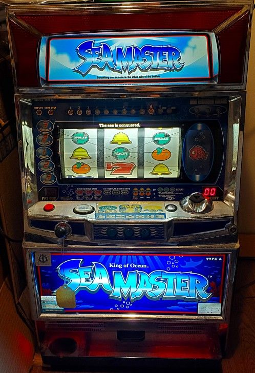 Machine Like Packman, But It's A Tokin Machine. SeaMaster.  It.lights Up When You Get Certain Pictures In A Row