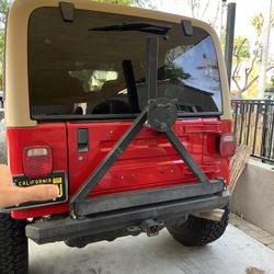 Wrangler TJ Bumper Spare Tire Carrier 