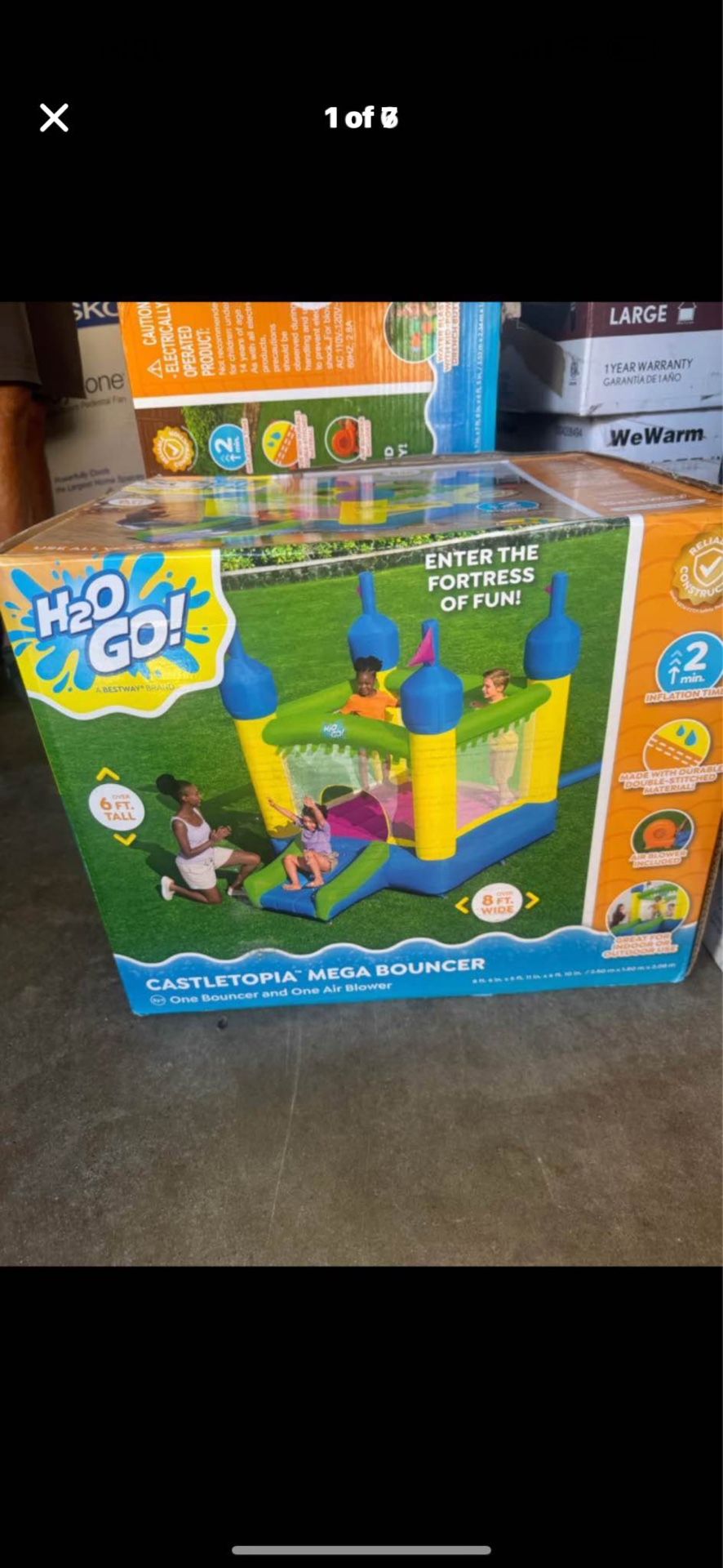 H2OGO! Castletopia Bounce House with Extra-Wide Slide and Blower, Indoor/Outdoor, Ages 3+ 5