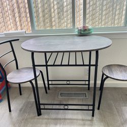 Table and dining chairs