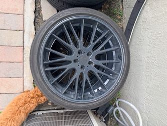 Dark Gray Multi-Spoke Alloy Wheel with Tire