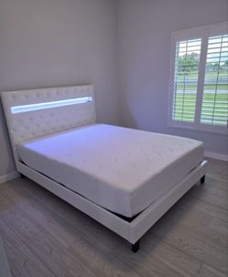 Full white beds with mattress included