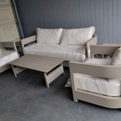 Outdoor patio furniture deep seating couch with chairs side tables and coffee table 