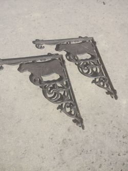 Cast iron shelf brackets