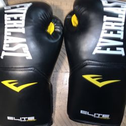 never used EVERLAST ELITE BOXING GLOVES. 