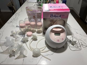 Spectra s2 pump with accessories and hands free pumping bra
