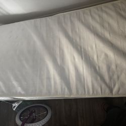 Twin mattress and metal twin bed frame