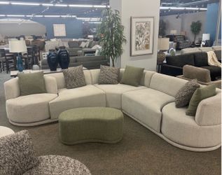 West Elm chenille sectional couch with swivel chairs and ottoman