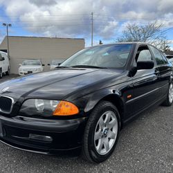 2001 BMW 325i Sedan 	•	Only 103k original miles 	•	Clean title • 2 owners 	•	Black exterior / Black leather interior 	•	Power sunroof 	•	Newer tires 	