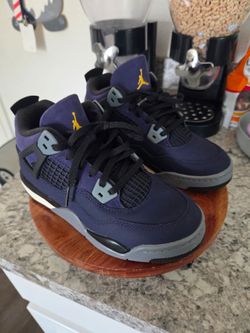 Kids Purple jordans size 1.5