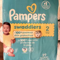 Two Packs Of Diapers Size One And Two