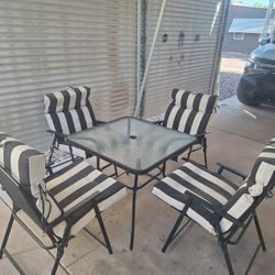 Patio Set and  4 Chairs With Cushions