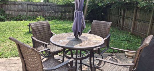 6-Piece Outdoor Wicker Swivel Bar Height Dining Set with Stone Top Table and Umbrella