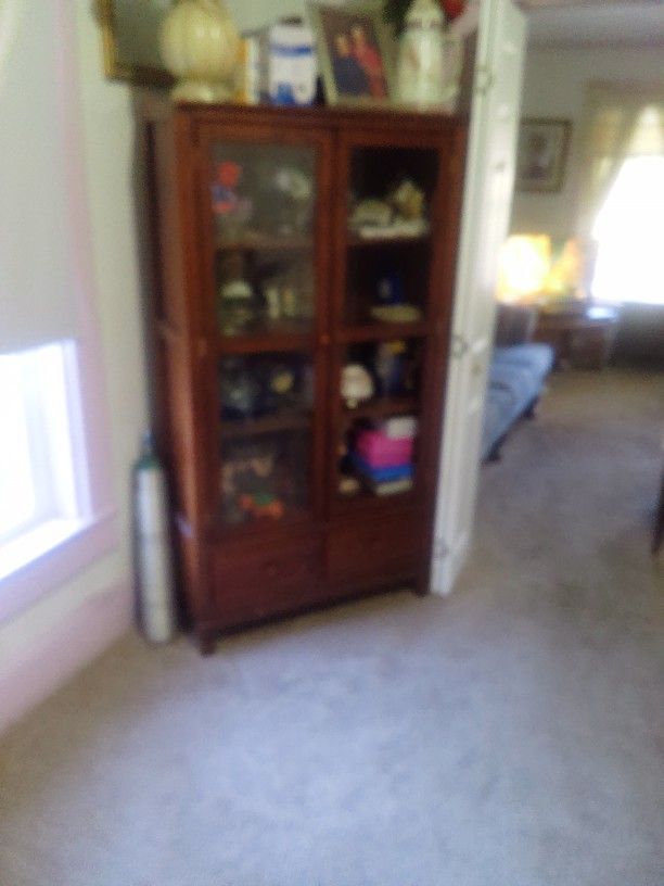 China Cabinet Tall One $100. And Small $ 75 Wheel Chair Is New $35