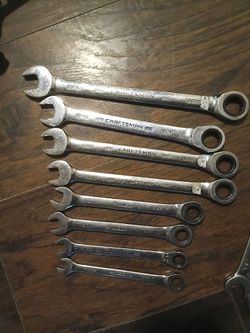 Open end racheting wrenches