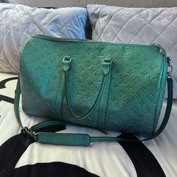 Authentic Louis Vuitton Keepall XS Taurillon Illusion bag