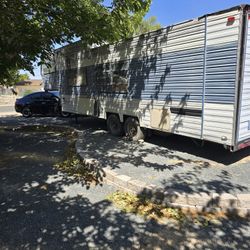 28ft. 1976 Terry Toy Hauler 5th Wheel.