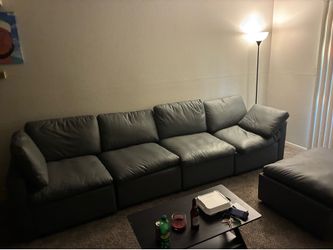 Grey Faux Leather Sectional (4 seats with ottoman)