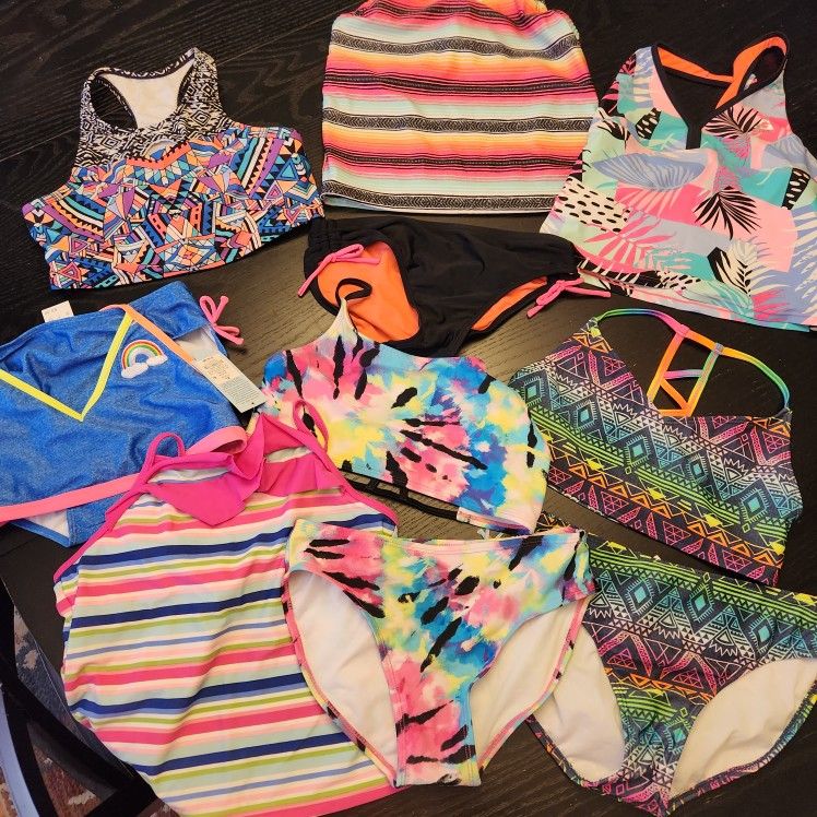 5 Swim Suits And 2 Extra Tops