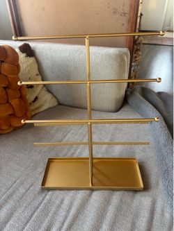 Gold jewelry stand