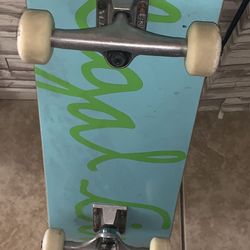 CowTown Skateboard Blue And Green With Bones Wheels