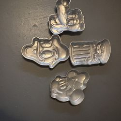 Assorted Disney and Sesame characters cake pans 