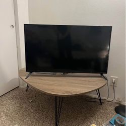 42 inch Insignia Smart TV (2021) + coffee table