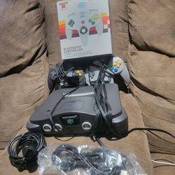 Nintendo 64 Console and Three Controllers