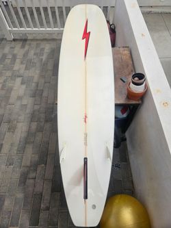 9'6" Lightning Bolt surf board