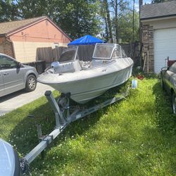 17 1/2 Foot Inbored Boat And Trailer 