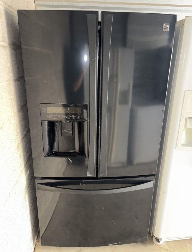 Black Kenmore Refrigerator And Freezer