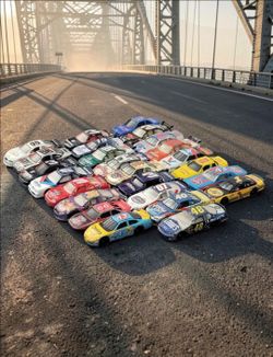 (Lot Of 24) Assorted Racing Champions NASCAR Numbered Cars Various Conditions Loose. Here is the row-by-row breakdown of the 24 diecast cars in the co