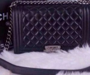 Beautiful black handbag purse with amazing locket. Plus chain