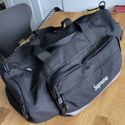 SUPREME HI VIS REFLECTOR BLACK DUFFLE