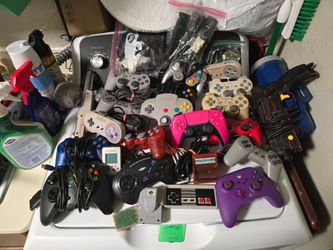 Lot of (28) broken controllers and accessories ps5, ps2, ps1, n64, Sega, wii