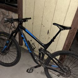 Dual Suspension Trek Mountain Bike.
