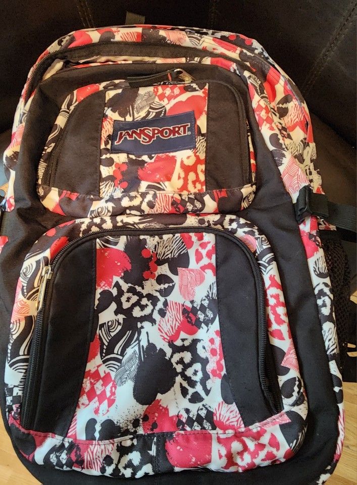 Very Unique Backpack JanSport-- Hablo Espańol 