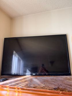 RCA TV with the wall mount attached